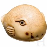 A signed Japanese ivory Netsuke of a blowfish, Meiji period, 19th centuryCarved, engraved and chased