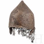 A Khasarianian iron helmet, 12th - 13th centuryTwo-piece iron calotte. The upper half of the