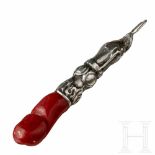 A probably Italian silver mounted coral pendant in the shape of a phallus, 19th centuryFine silver