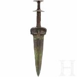 A Luristan Bronze dagger with disc pommel, circa 10th century B.C.Blade and hilt worked