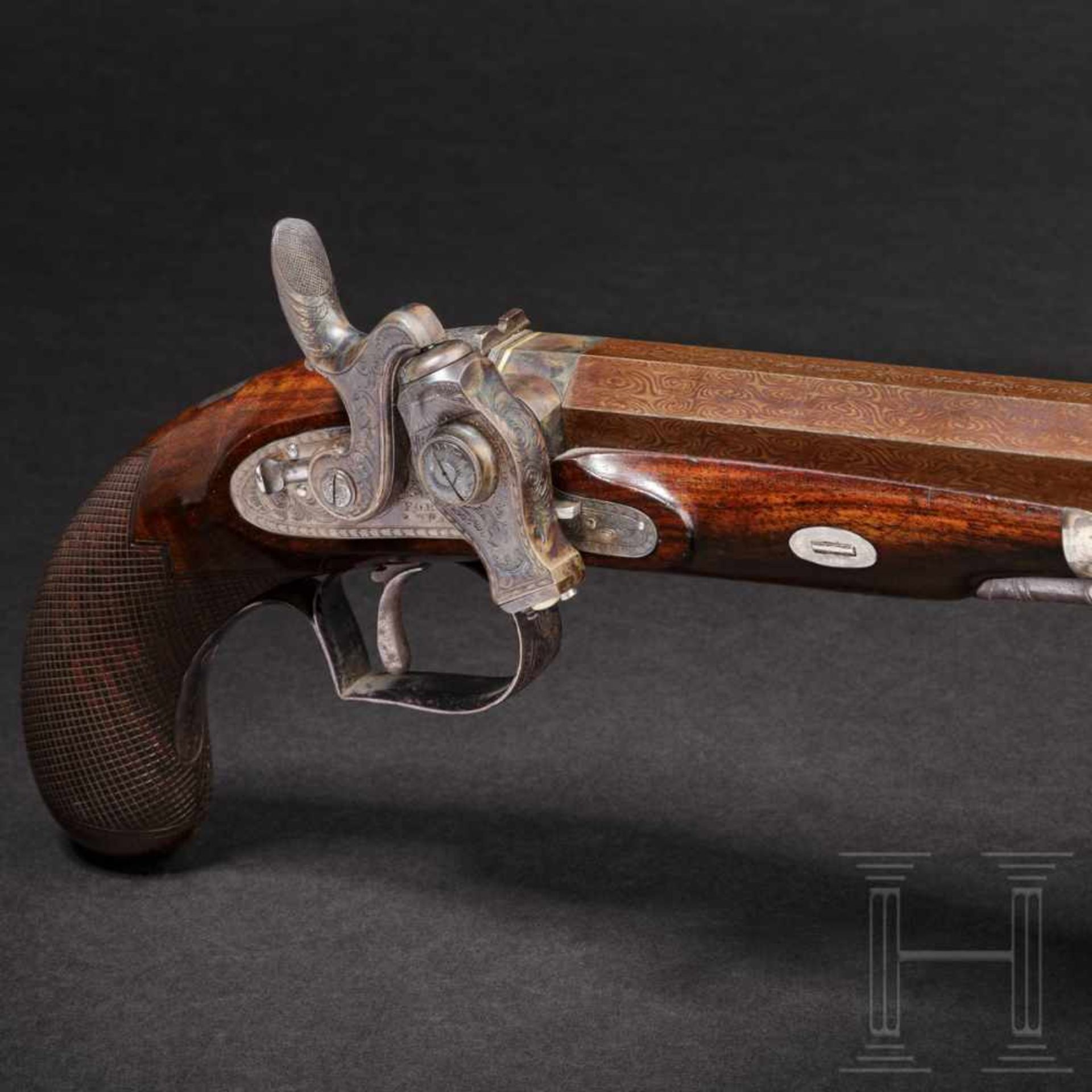 A pistol with a Forsyth firing system, Forsyth & Co, London, circa 1820Octagonal, blued Damascus