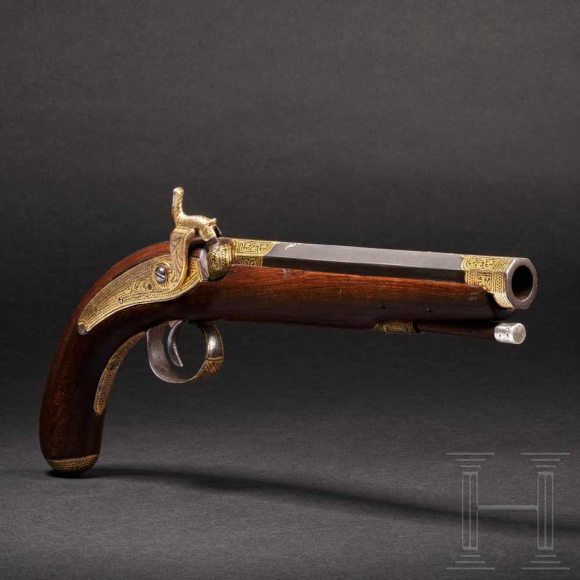 An Indian gold-damascened percussion-pistol, 2nd half of the 19th centurySchwerer achtkantiger