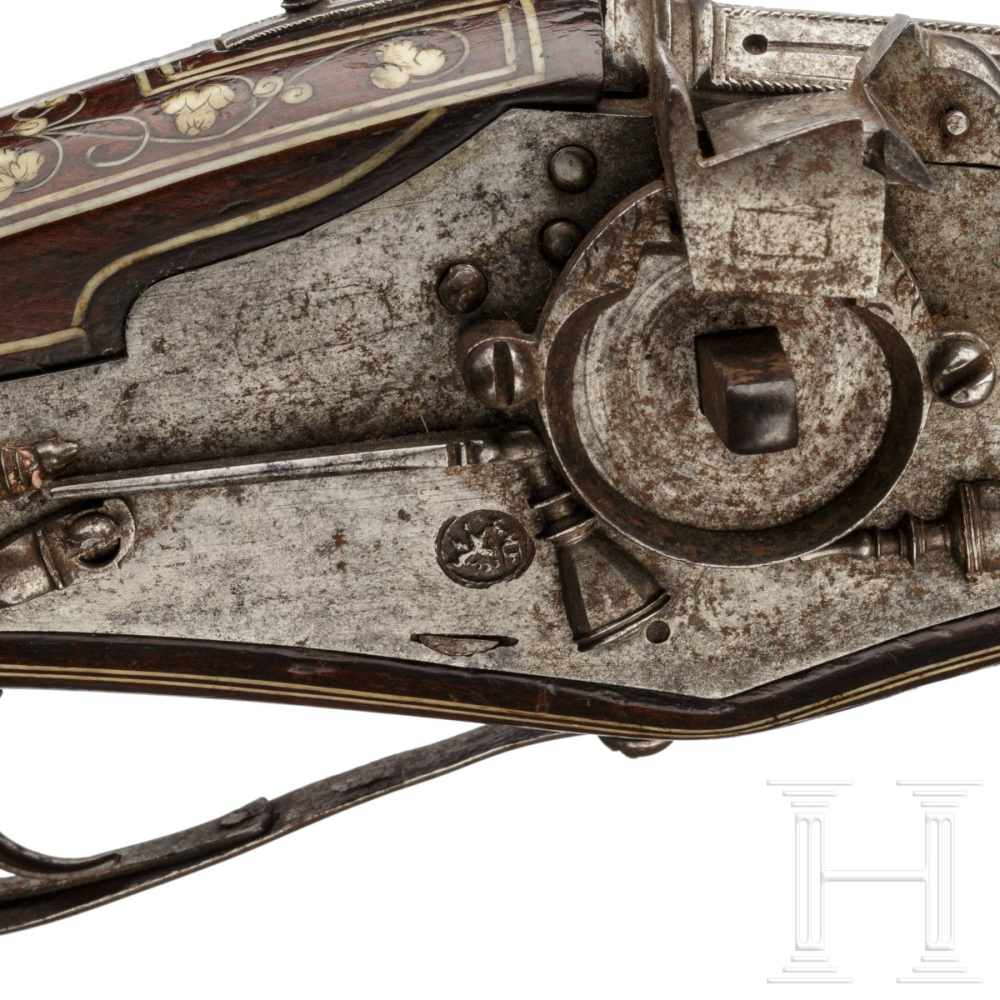 A pair of bone-inlaid, extremely long wheellock pistols, Nuremberg, circa 1600The long, round, - Image 8 of 9