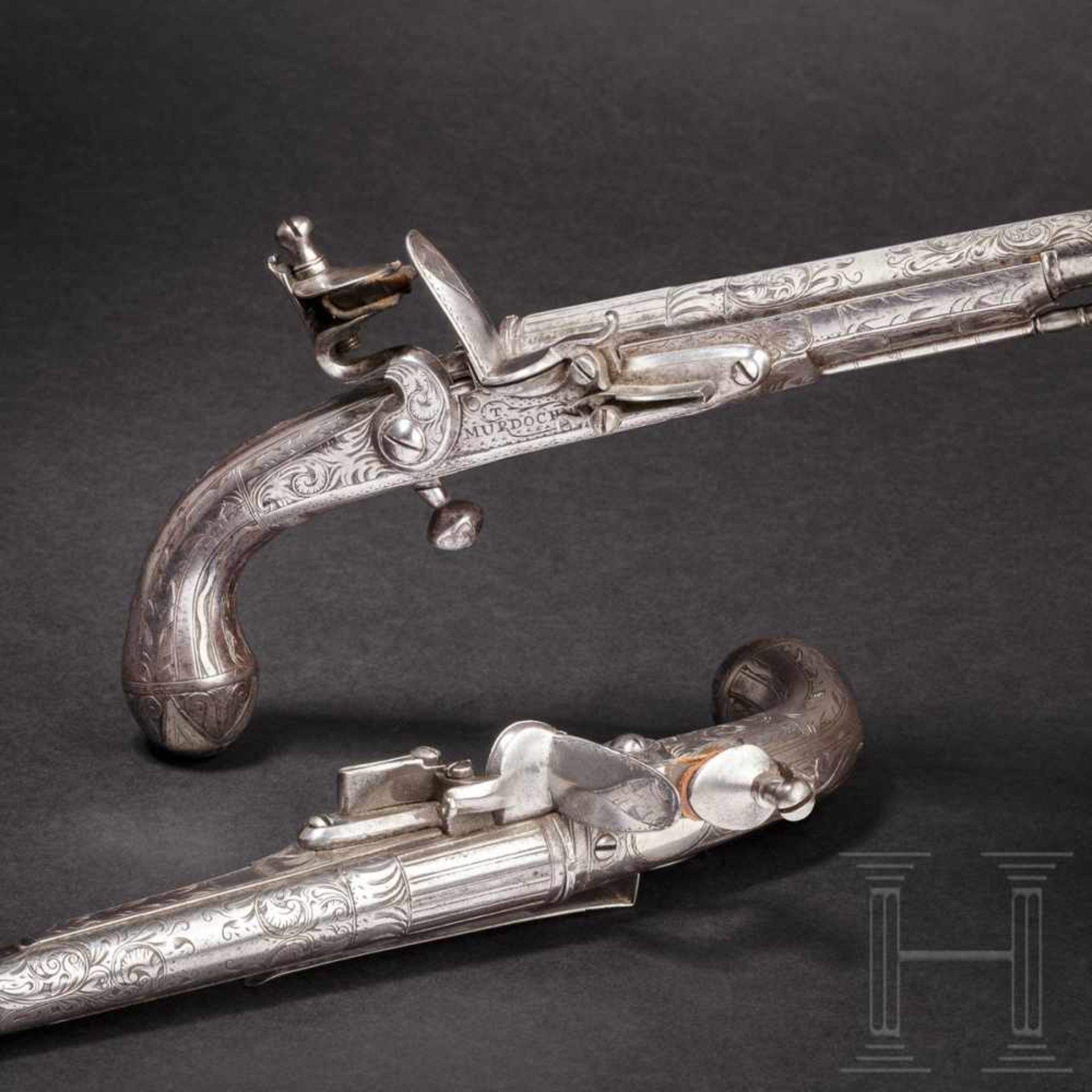 A pair of Scottish all-metal flintlock pistols, Thomas Murdoch, circa 1750The round barrels