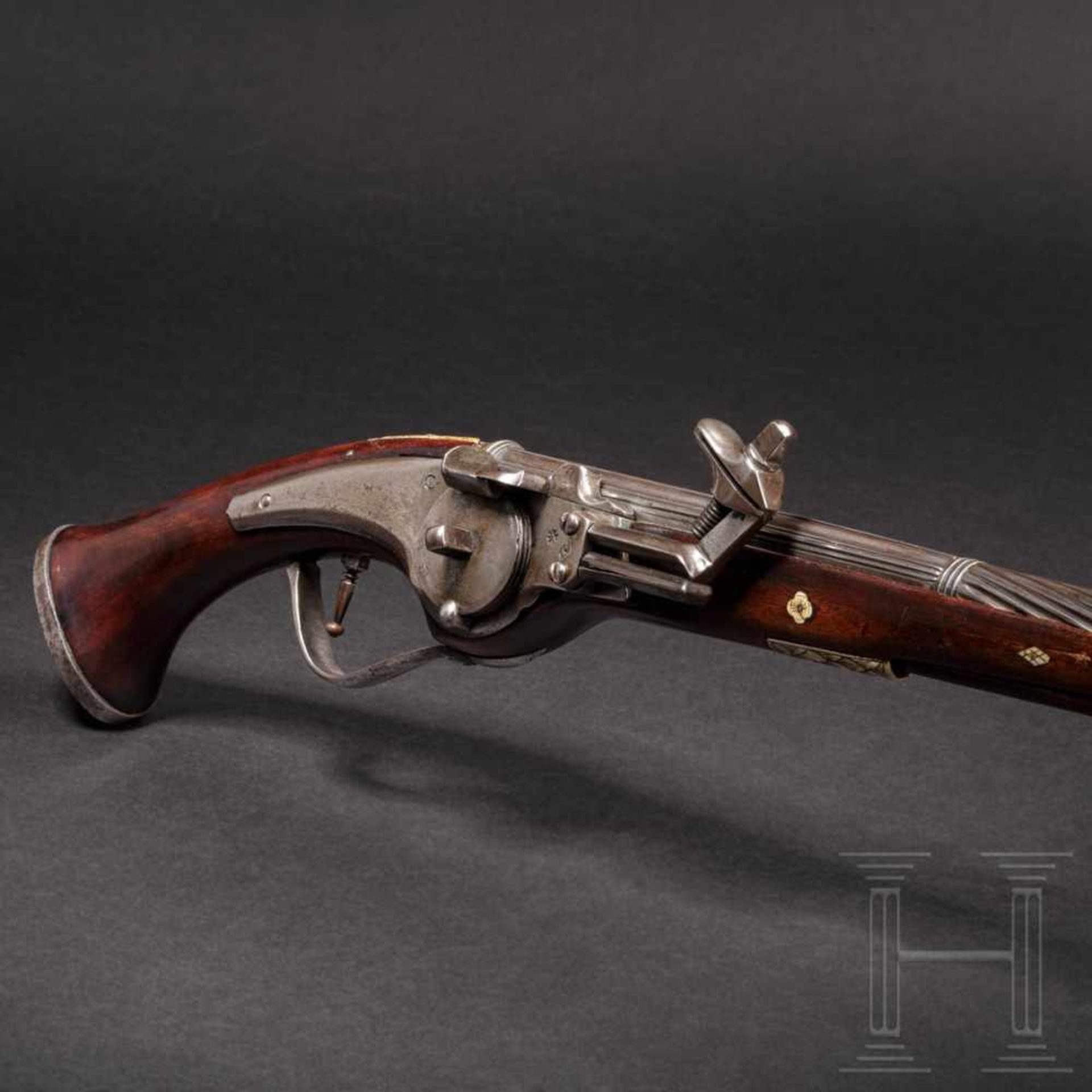 A long German wheellock pistol with a chiselled barrel, circa 1630The long, smooth barrel with