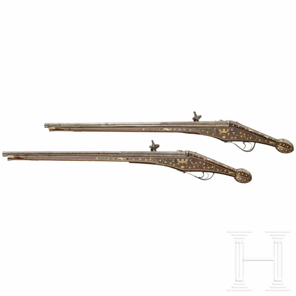 A pair of bone-inlaid, extremely long wheellock pistols, Nuremberg, circa 1600The long, round, - Image 3 of 9