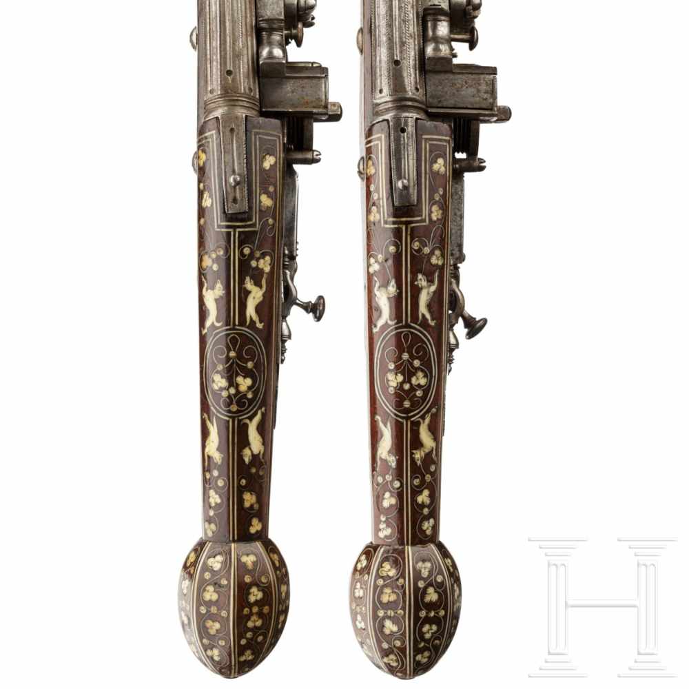 A pair of bone-inlaid, extremely long wheellock pistols, Nuremberg, circa 1600The long, round, - Image 6 of 9