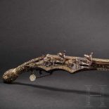 A rare, South German wheellock pistol for two superimposed loads, with inlays in gold and bone,