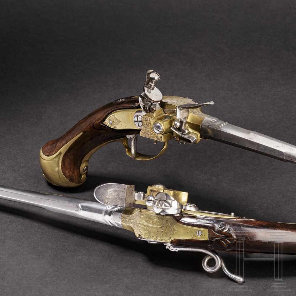 A pair of unusual self-loading flintlock pistols, Emanuel Wetschgin in Augsburg, circa 1710Octagonal