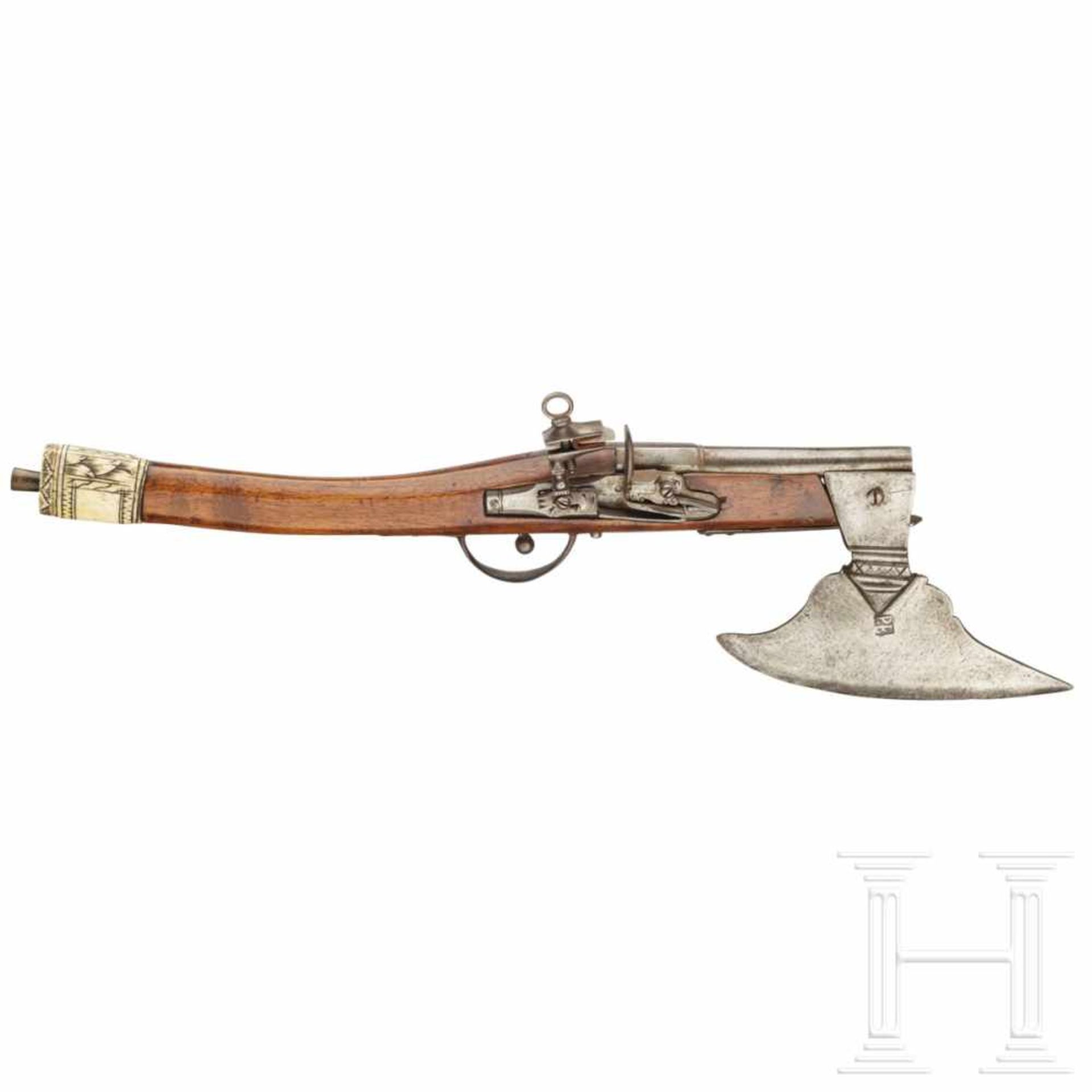 A rare battle axe with integrated flintlock pistol, probably Saxony, 18th centuryThe slightly semi-