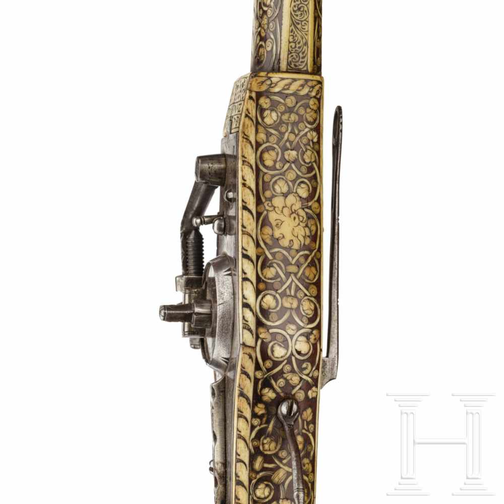 A German wheellock puffer, lavishly inlaid in bone, dated 1573The smooth octagonal barrel turning to - Image 10 of 10