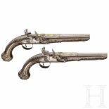 A pair of Ottoman silver-mounted deluxe flintlock pistols, circa 1820Round, single-stepped barrels