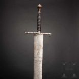 A German executioner's sword, 17th centuryThe broad, double-edged blade with a blunt chape, etched