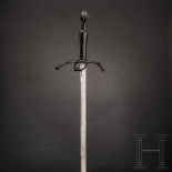 A fine southern German knightly hand-and-a-half sword, circa 1520/30Slender single-edged blade