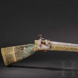 A magnificent Ottoman deluxe miquelet rifle with gilt silver mounts, circa 1780The octagonal