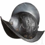 A German black and white morion, late 16th centuryZweiteilig gearbeitete Kalotte mit hohem,