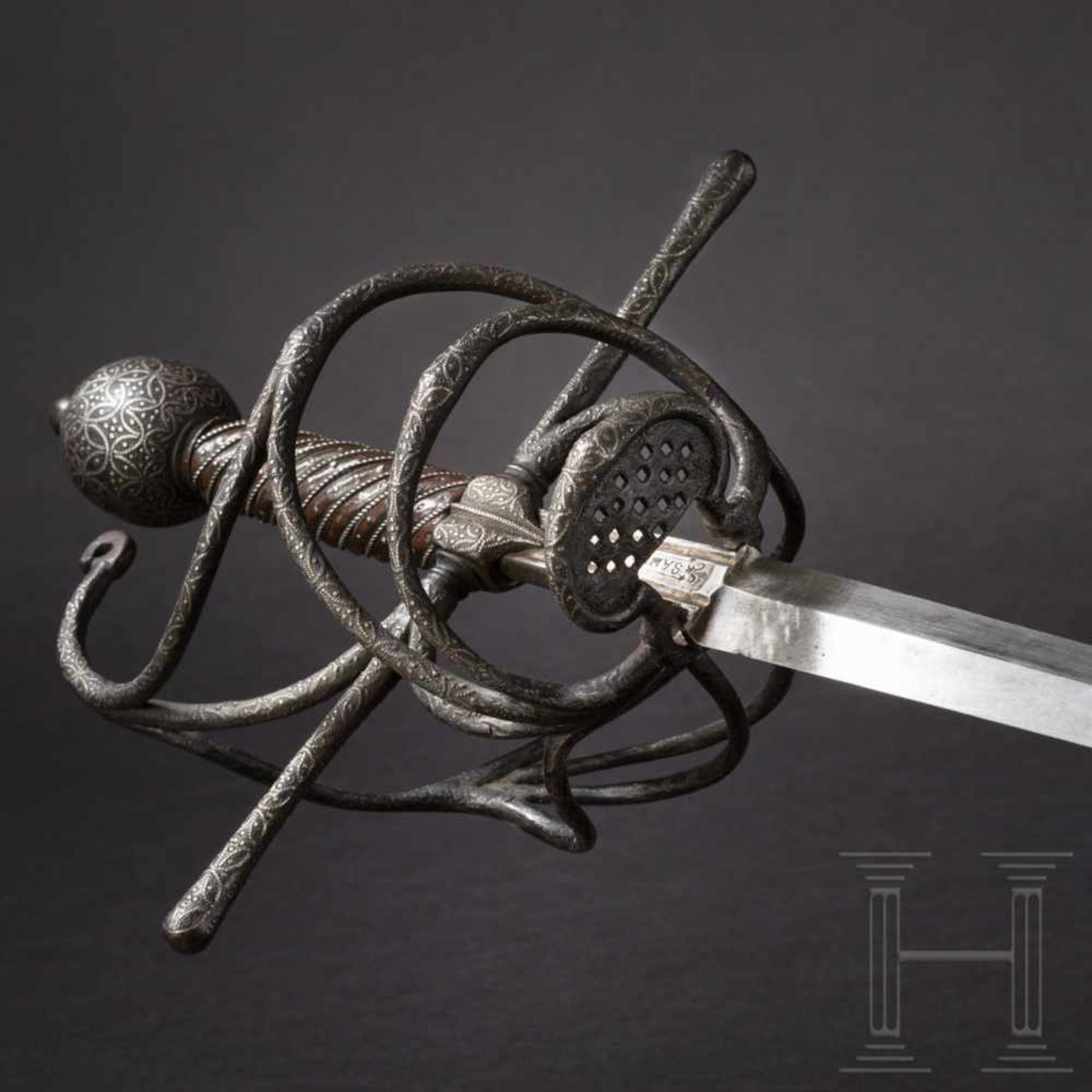 A German silver-inlaid rapier, circa 1600Long, double-edged thrusting blade of diamond section. A