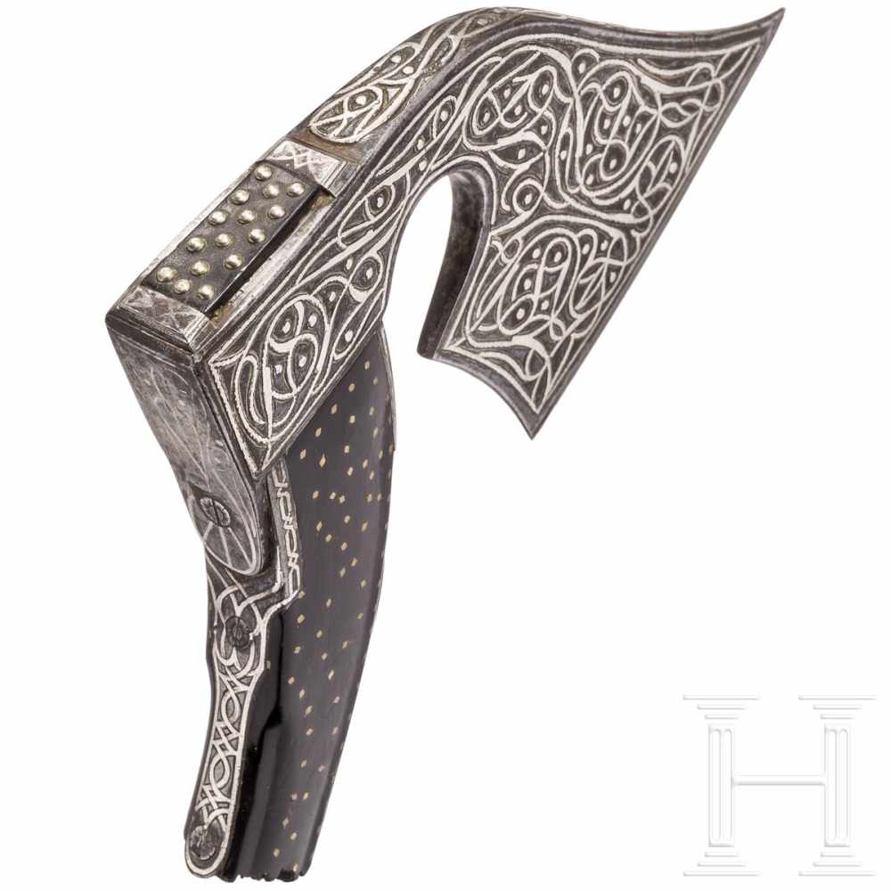 A splendid Ottoman axe head, 18th centuryLight, strongly curved axe head chiselled and inlaid in - Image 3 of 4