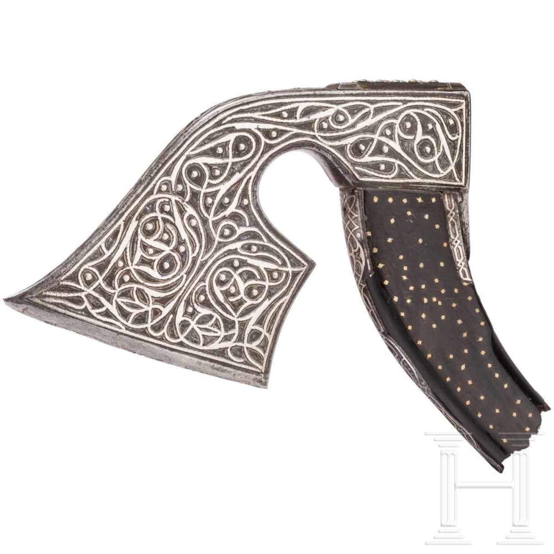 A splendid Ottoman axe head, 18th centuryLight, strongly curved axe head chiselled and inlaid in