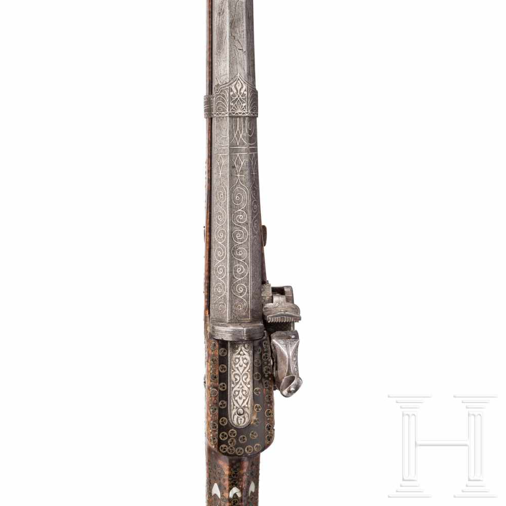 A small Ottoman miquelet-lock rifle (tufek), 18th centuryOctagonal swamped barrel of Damascus - Image 4 of 5