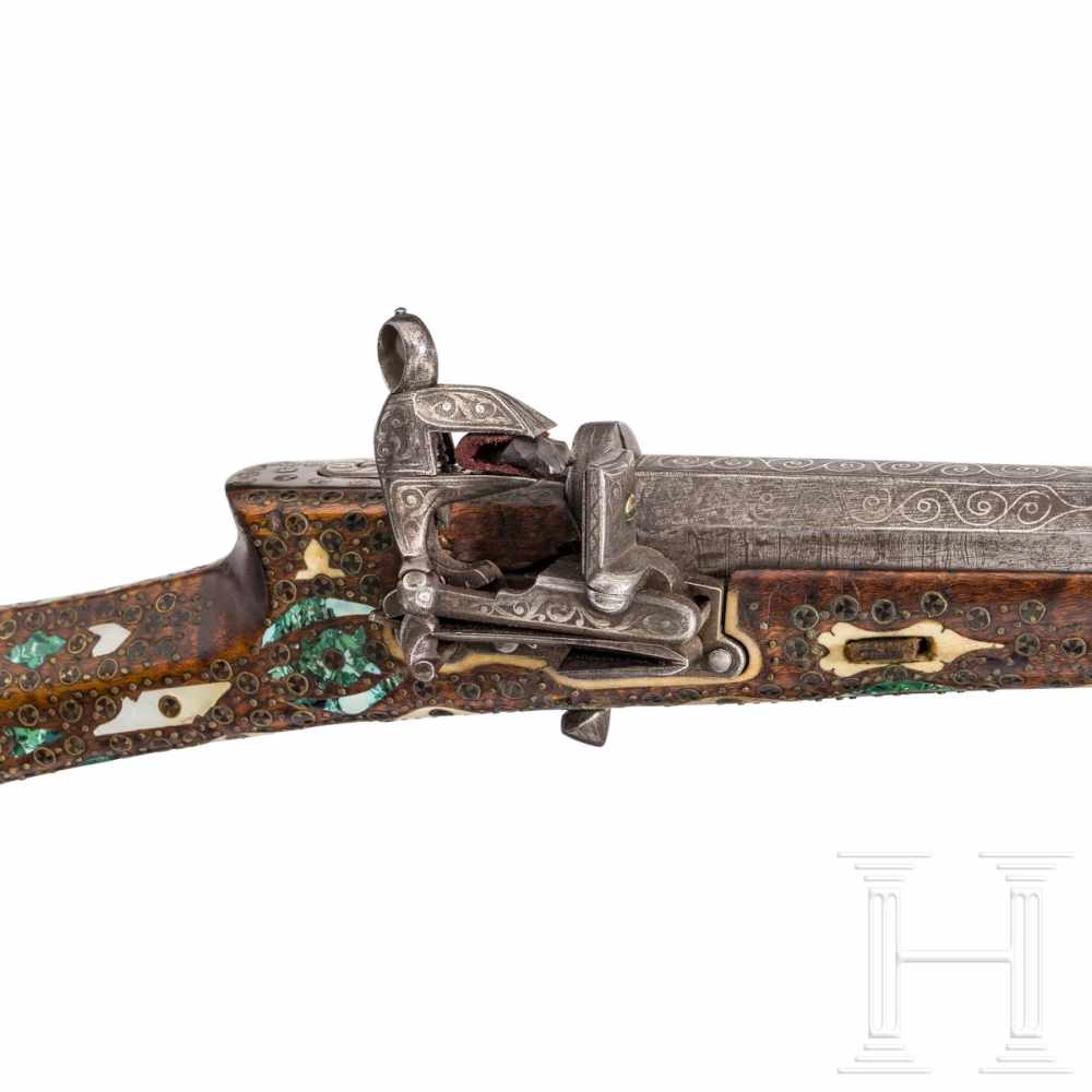 A small Ottoman miquelet-lock rifle (tufek), 18th centuryOctagonal swamped barrel of Damascus - Image 3 of 5