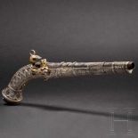 A Caucasian silver-mounted miquelet pistol, mid-19th centuryRound, smooth bore Damascus barrel in