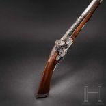 A luxurious Italian miquelet-rifle with chiselled decoration, Brescia, circa 1680Round barrel with