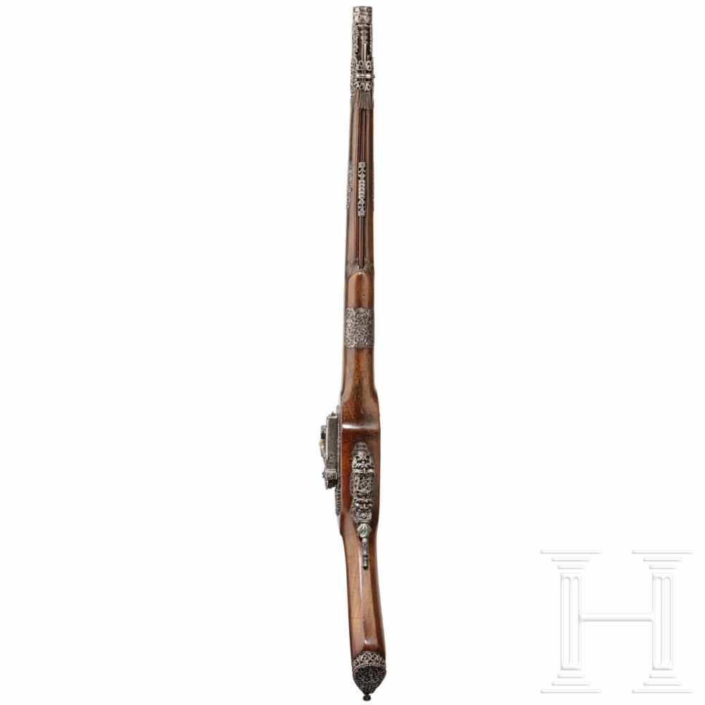 A luxurious Italian miquelet-rifle with chiselled decoration, Brescia, circa 1680Round barrel with - Image 8 of 11