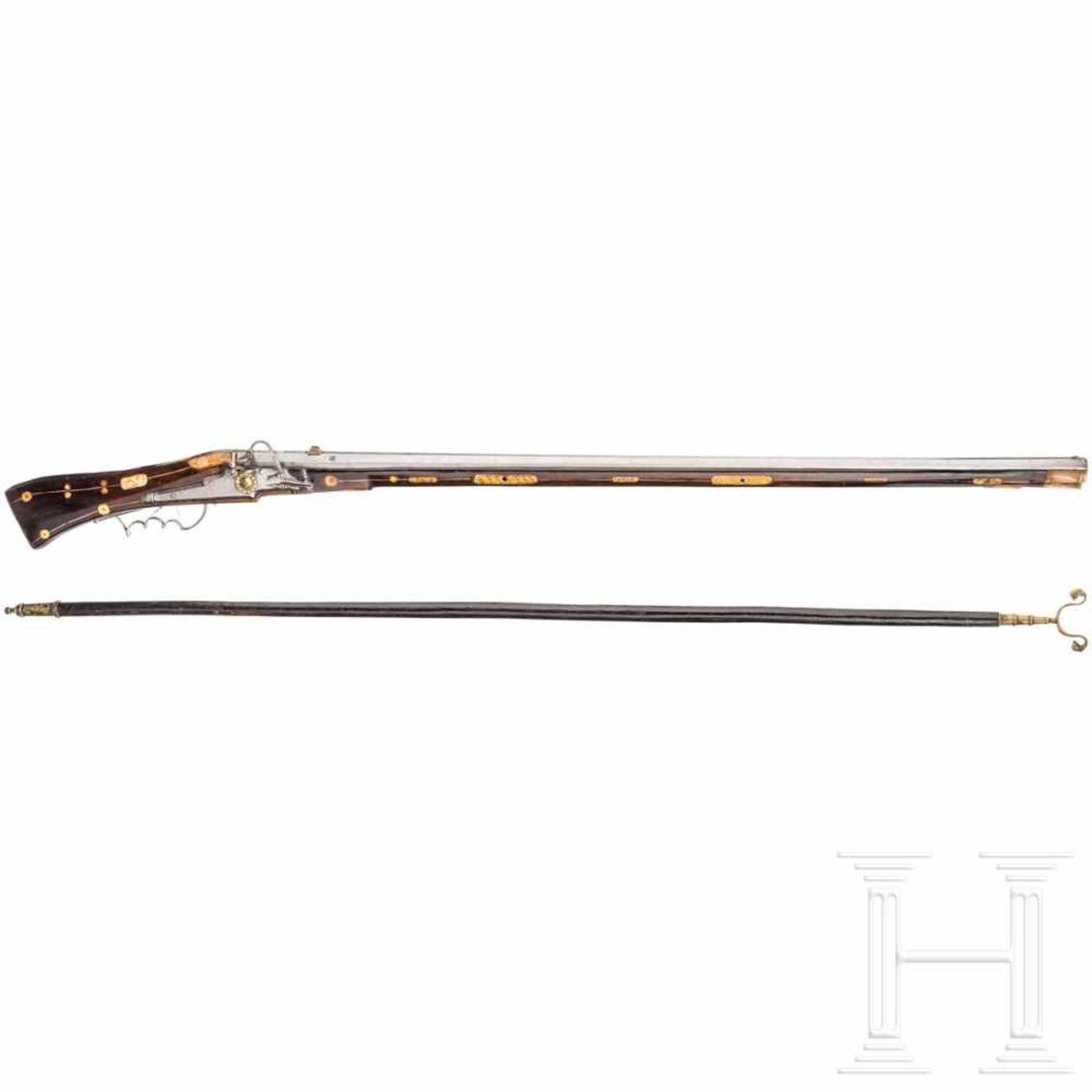 A heavy German bone-inlaid matchlock musket with musket support, dated 1589The octagonal barrel
