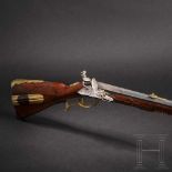 A deluxe flintlock rifle, Caspar Neureitter of Prague, circa 1730The octagonal barrel slightly