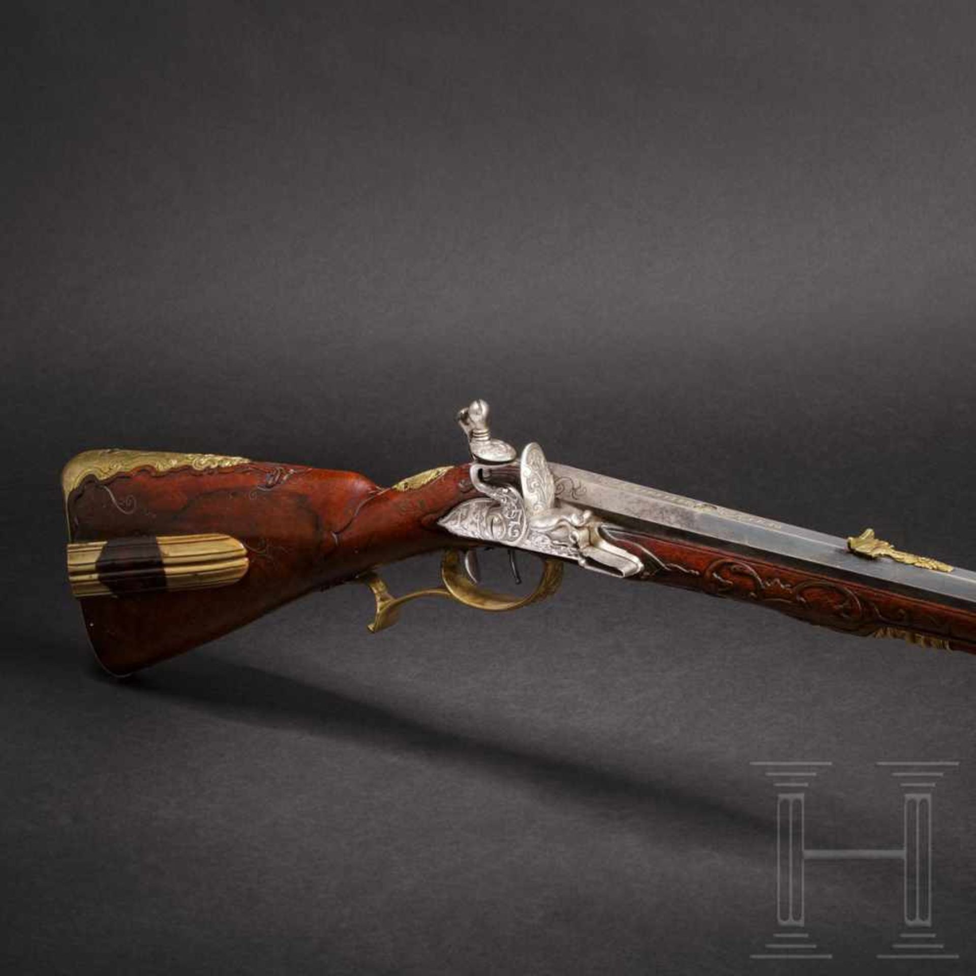 A deluxe flintlock rifle, Caspar Neureitter of Prague, circa 1730The octagonal barrel slightly