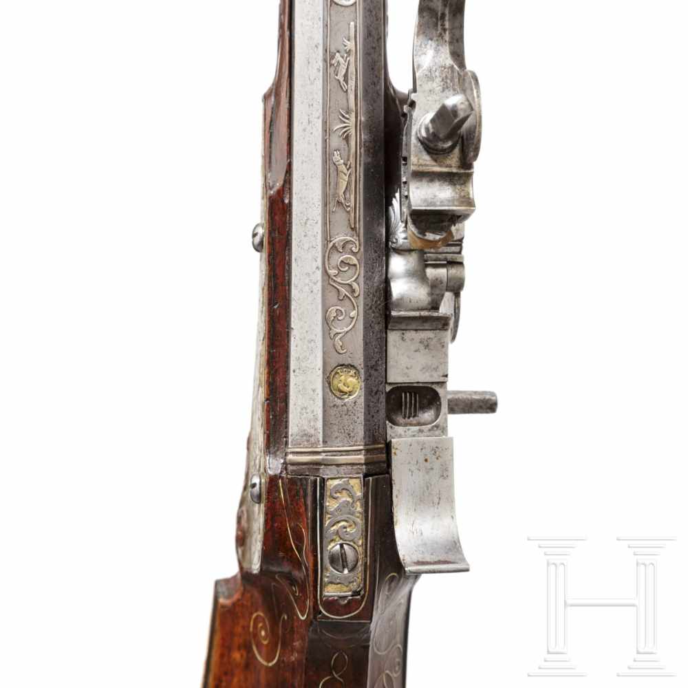 A fine wheellock rifle with chiseled lock, Augsburg, circa 1700Octagonal, lightly tapered barrel - Image 6 of 8