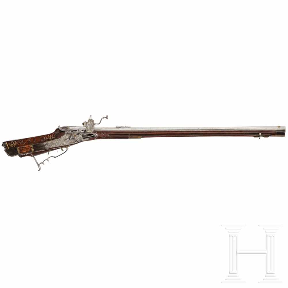 A fine wheellock rifle with chiseled lock, Augsburg, circa 1700Octagonal, lightly tapered barrel - Image 2 of 8