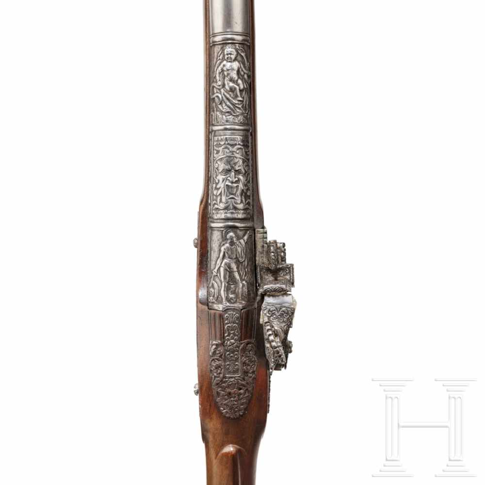 A luxurious Italian miquelet-rifle with chiselled decoration, Brescia, circa 1680Round barrel with - Image 6 of 11