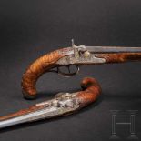 A fine pair of southern German percussion pistols with chiseled mounts, circa 1780Round tapered