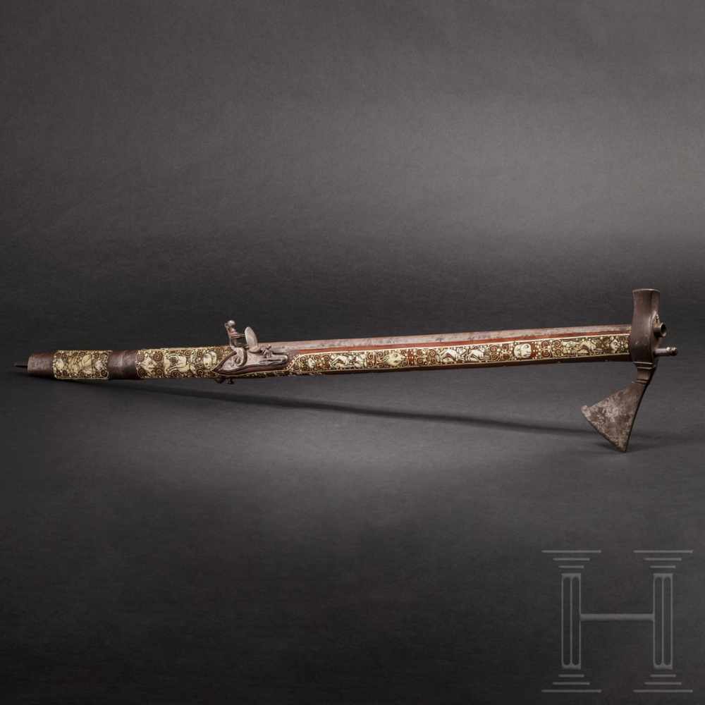 A Silesian battle axe with integrated flintlock and dagger, circa 1700Smooth barrel in 10 mm