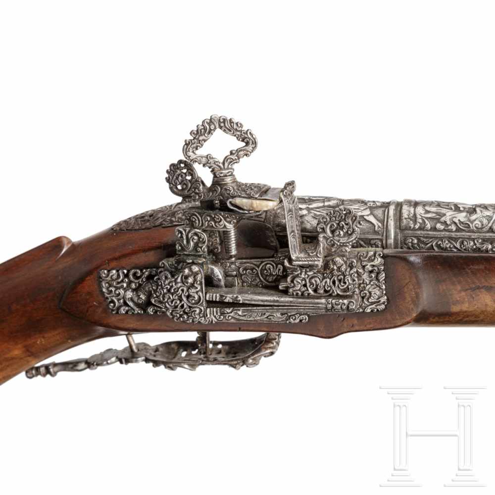 A luxurious Italian miquelet-rifle with chiselled decoration, Brescia, circa 1680Round barrel with - Image 5 of 11