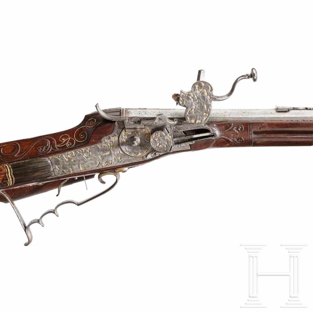 A fine wheellock rifle with chiseled lock, Augsburg, circa 1700Octagonal, lightly tapered barrel - Image 4 of 8