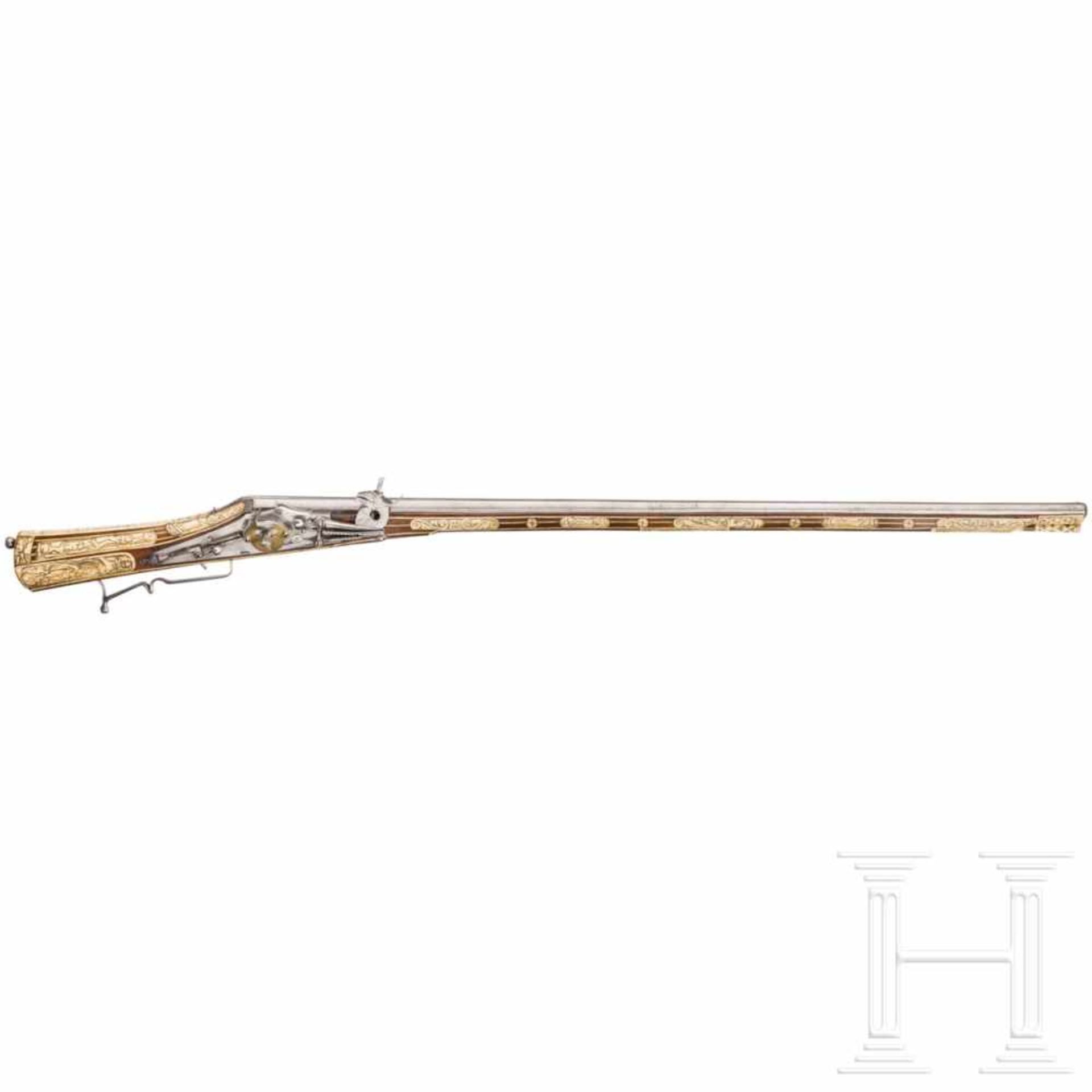 A southern German deluxe wheellock rifle with rich bone veneer, circa 1570Slightly tapered,