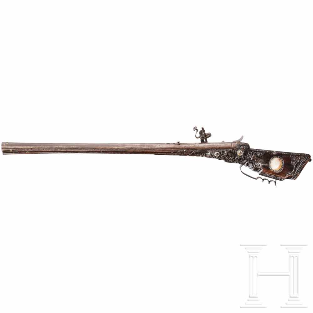 A southern German carved wheellock rifle with mother-of-pearl inlays in the style of the Maucher - Image 2 of 8