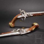 A pair of Flemish, long breechloading flintlock pistols, circa 1720/30The round barrels with