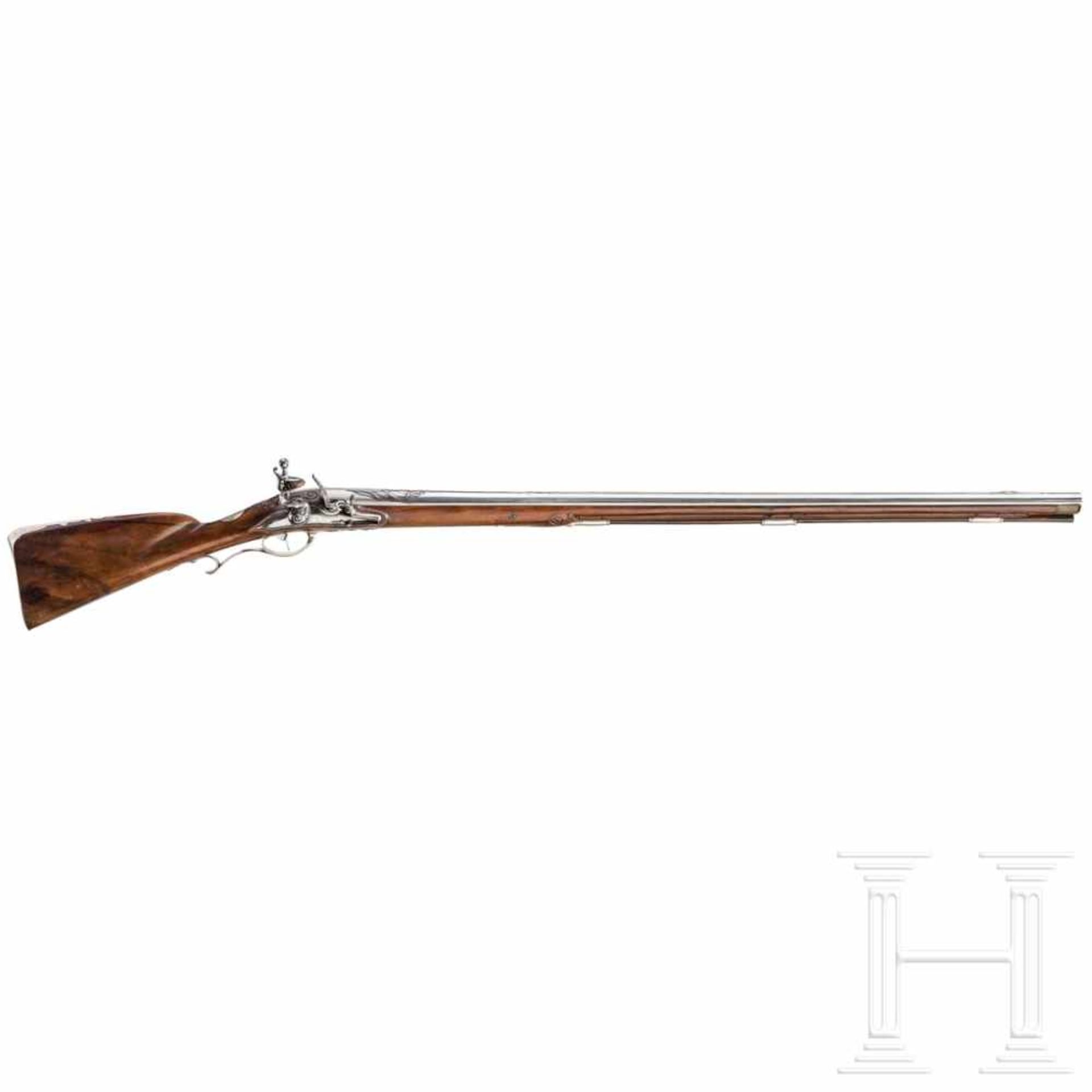 A silver-mounted flintlock rifle, Friedrich Ostermann, Copenhagen, circa 1710/20Round barrel with