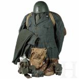 A uniform M 1940 for members of the infantry and equipmentFeldgrau lackierter Stahlhelm mit