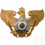 An eagle emblem for guard officers, circa 1900Messing, geprägt, frostig vergoldet mit polierten