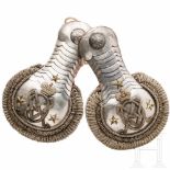 A pair of epaulettes for a Poruchik, circa 1910The epaulettes with silver fields and crescents, with