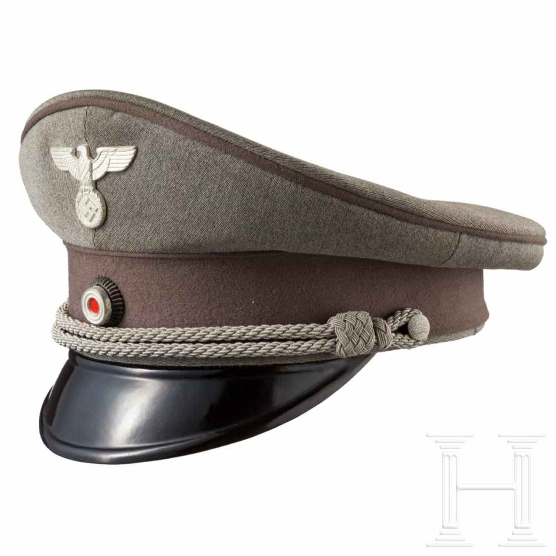 A visor cap for leaders of the Reich Ministry for Public Enlightenment and PropagandaFine light-grey