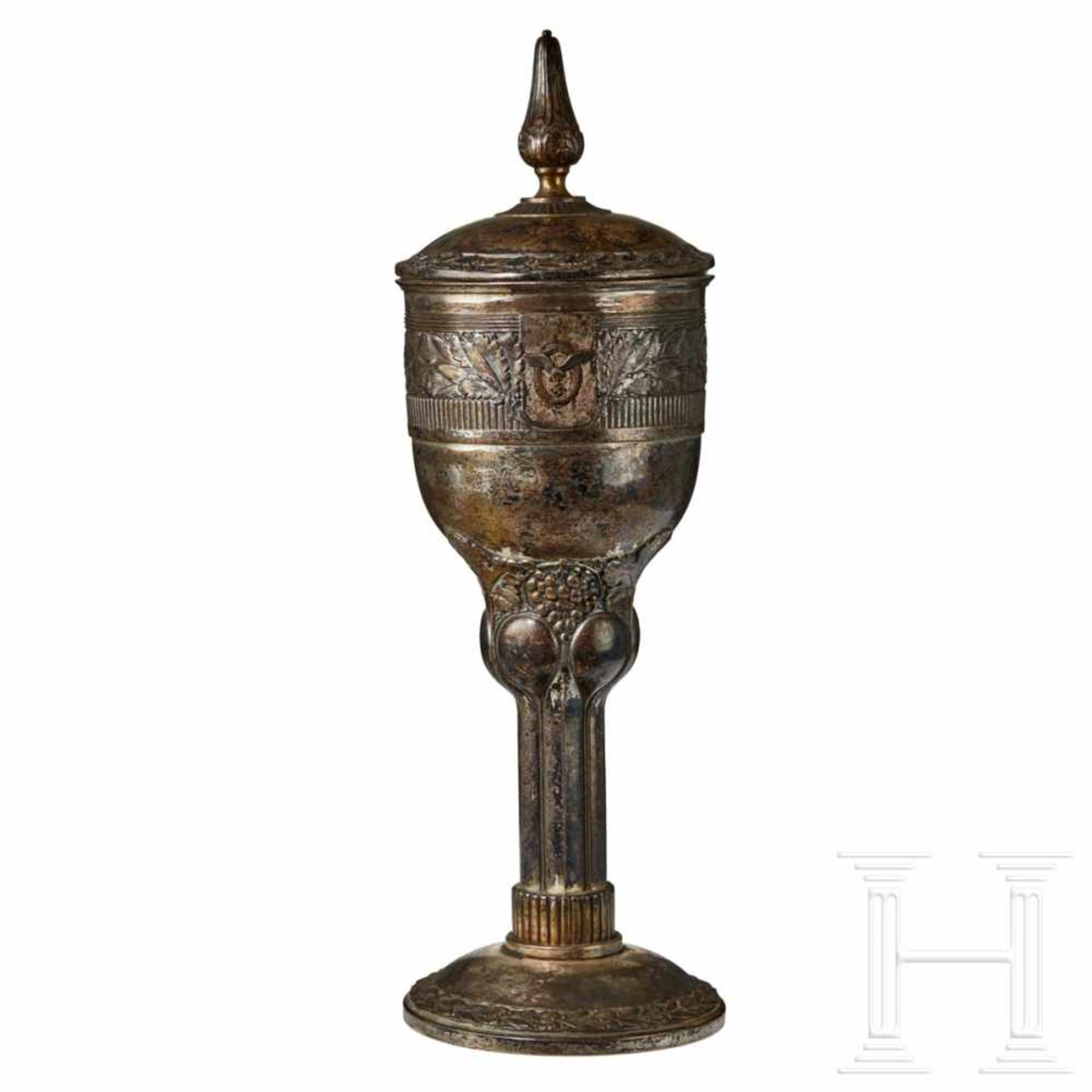 A decorative Flyer’s GobletLarge, silver plated goblet with detachable lid, decorative motif of