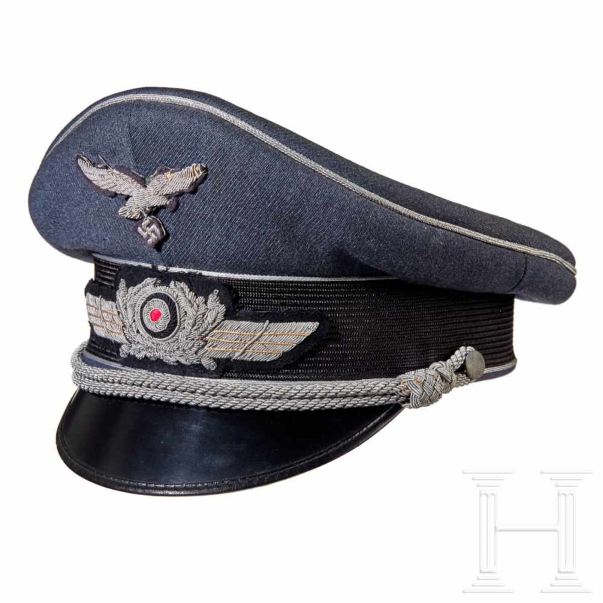 A visor cap for officers of the LuftwaffeBlue-grey finely ribbed tricot wool body with black