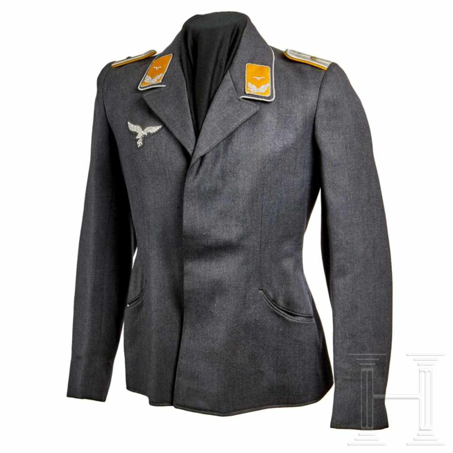 A Fliegerbluse for an officerLuftwaffe blue-grey tricot wool, four hidden buttons (silver NSDAP),