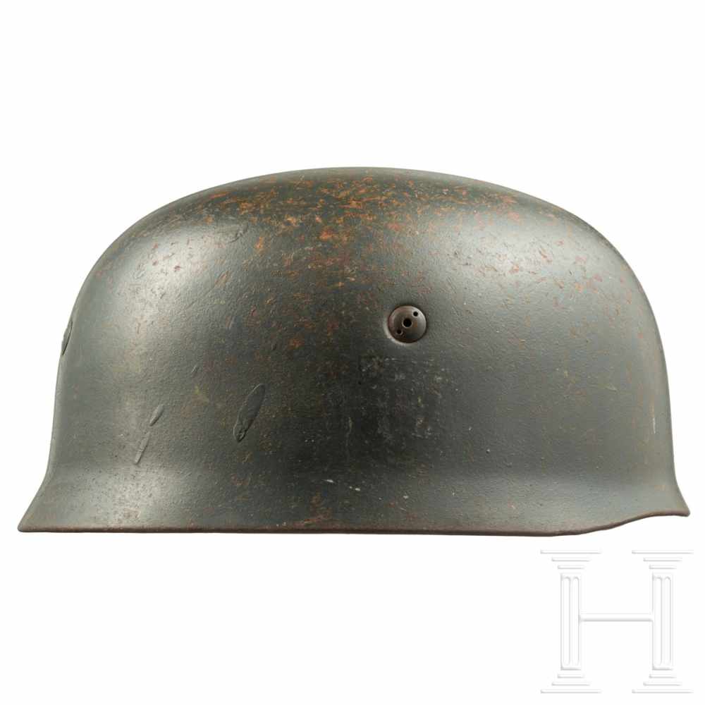 An M 38 steel helmet for paratroopersThe skull stamped "ET68" and "1849"(?). Early two-hole screws - Image 2 of 7